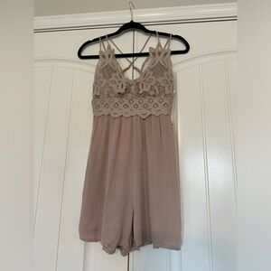Brand new gauze romper with lace trim
